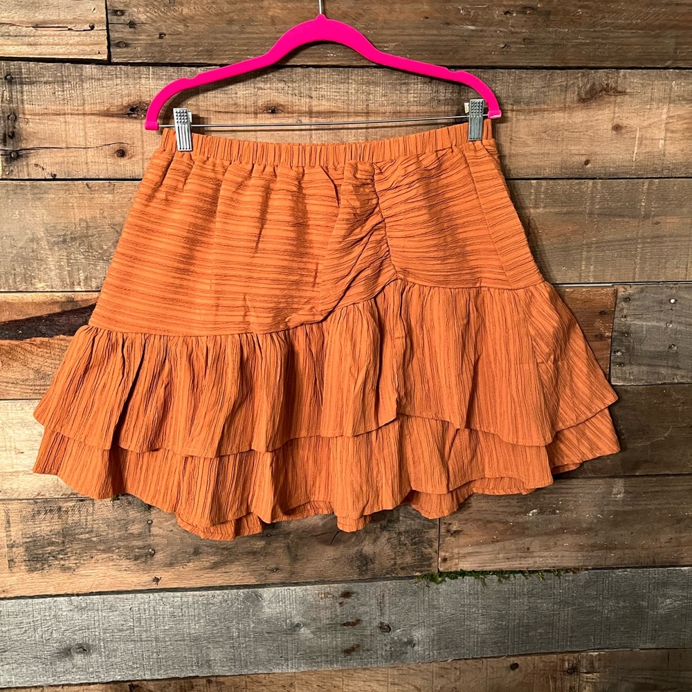 Never worn ruffled mustard mini skirt